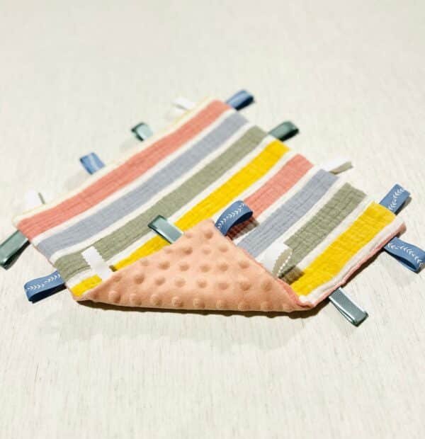 Pink/yellow/blue/green tag lovey
