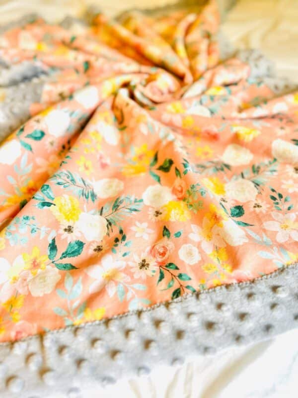 Gray/coral floral blanket