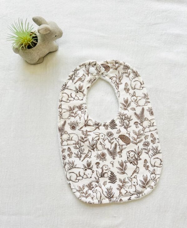 Brown woodland animal bib